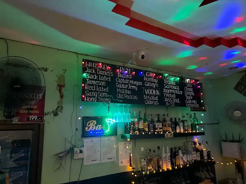 Bar counter and menu boards inside Apple Bar