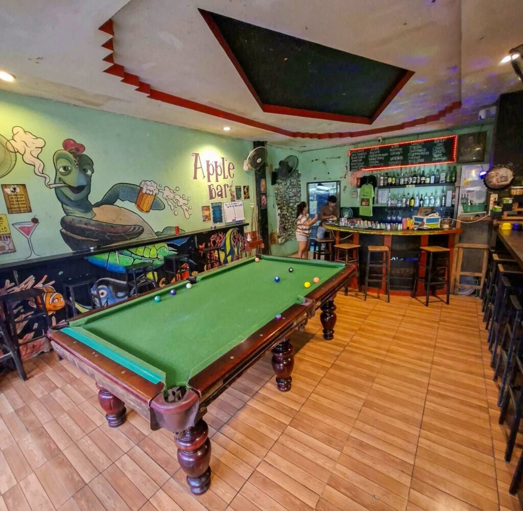 Pool table and bar interior at Apple Bar in Koh Tao.